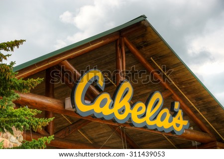 OWATONNA, MN/USA - AUGUST 9, 2015: Cabela\'s retail exterior. Cabela\'s retails hunting, fishing, camping, shooting, and related outdoor recreation merchandise.