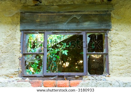 a window from an old house without glasses