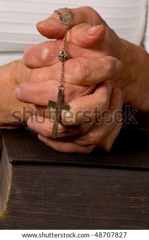 a close up view of praying hands