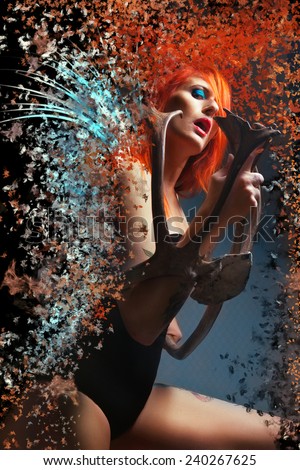Fantasy style photo of a woman with gorgeous red hair.red