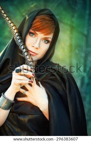 gothic woman in dark hood. gothic