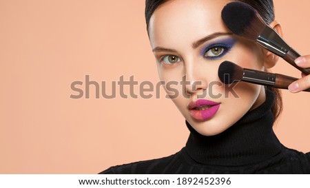 Image, Stock Photo Woman applying lipstick near car mirror