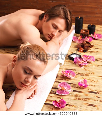 Couple lying on the massage desks on the spa salon. Beauty treatment concept.