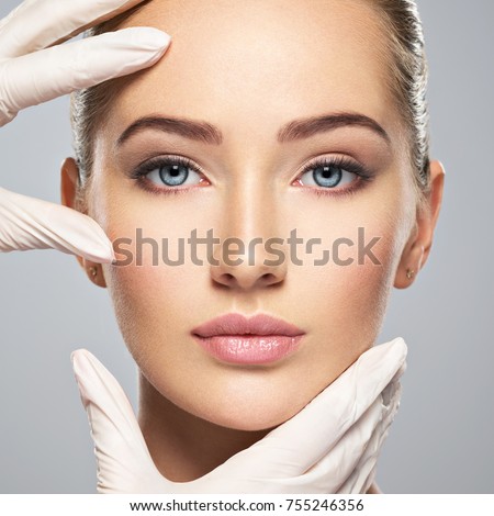 Similar – Image, Stock Photo woman with gloves touching her mask