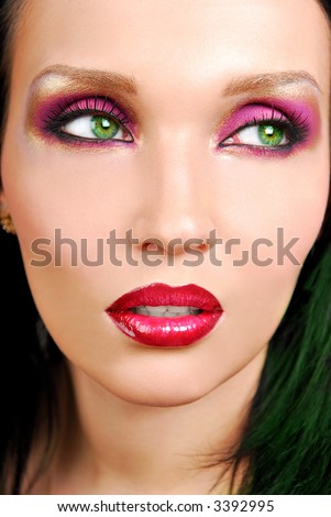 Abstract green eyes of beautiful girl. Devil sight