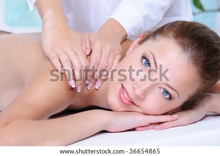 Close-up portrait of young beautiful woman relaxing in the beauty salon