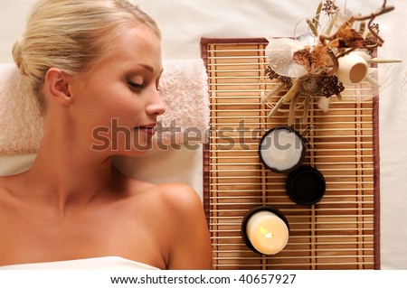 Young beautiful woman recreation in spa salon - high angle view