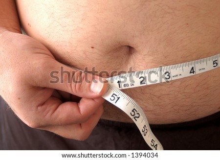 tape measure around mans belly