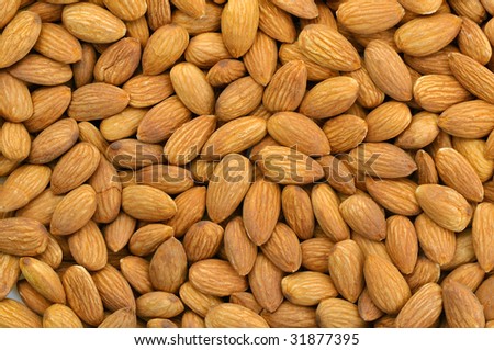 peeled almonds in background