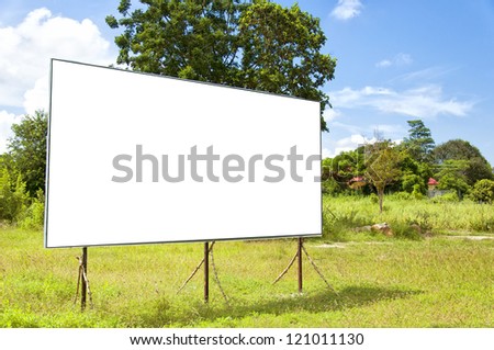 A blank bilboard situated in a rural location.