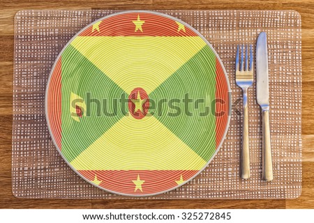 Dinner plate with the flag of Grenada on it for your international food and drink concepts.