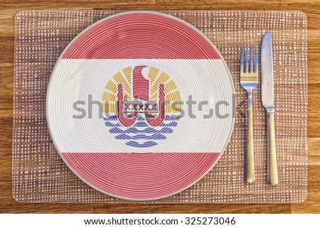 Dinner plate with the flag of French Polynesia on it for your international food and drink concepts.