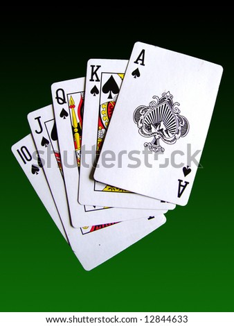 A Royal Flush Poker Hand Set Against A Green Gradient Background Stock ...