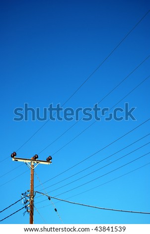 A telegraph pole carrying power and communication to the people of crete in Greece.
