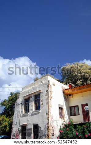 A view of an old crumbling building in the greek town of Chania.