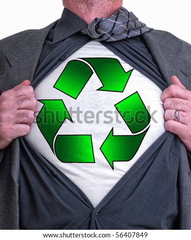 A business man isolated against a white background tearing open his shirt to reveal a recycle sign on a t shirt