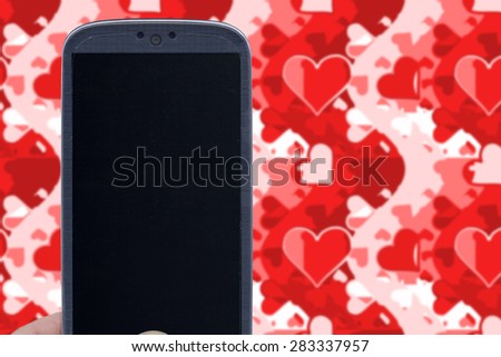 Blue smartphone and love wallpaper. Idea for Valentines Day messages, love, lovers, love apps, Internet, blogs and others.