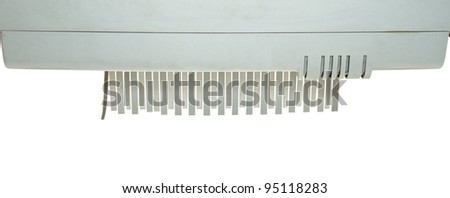 Paper shredder detail isolated on white background