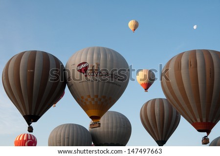GOREME, TURKEY - APRIL, 30: Hot air balloon fly over Cappadocia, the best attraction for tourists, on April 30, 2013 in Cappadocia, Turkey.