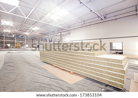 Wall Panels in Modern high-tech factory workshop construction site