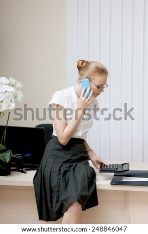 Busy  secretary working in the office.