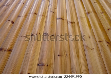 Background of structural wood products. Finishing boards block house.