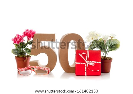 Celebrating your Fiftieth birthday, getting presents like reading glasses and a begonia