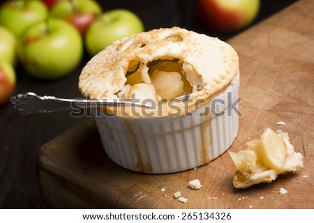 Bite Taken Out of a Miniature Single Serving Apple Pie