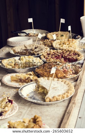 Selection of Pies Available for Sale at a Festival Booth or Food Truck