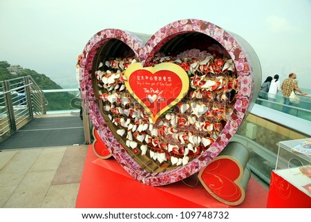 HONG KONG - MARCH 30: Love messages on the Victoria Peak on March 30, 2012 in Hong Kong. In many European countries, the hearts have been associated since the 15th century with romantic love.