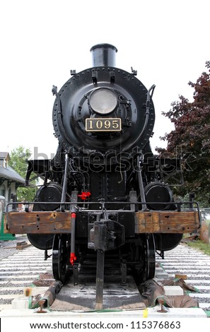 KINGSTON, CANADA - SEPTEMBER 7, 2012: An old locomotive on September 7, 2012 in Kingston. The locomotive, called Spirit of Sir John A., was in active service until 1960 and later became a landmark.