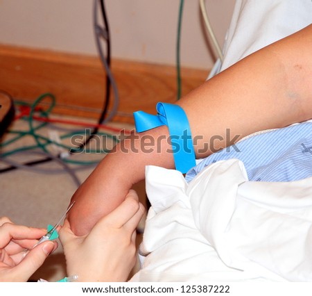 TORONTO - DECEMBER 21: A woman treated with intravenous therapy on December 21, 2012 in Toronto. Intravenous technology stems from studies on cholera treatment in 1831 by Dr Thomas Latta of Leith.