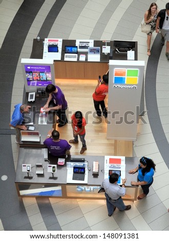 TORONTO - JULY 12: A Microsoft sales point at the Eaton Centre on July 12, 2013 in Toronto. Microsoft was founded by Bill Gates and Paul Allen on April 4, 1975.