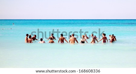 VARADERO, CUBA - DECEMBER 2: Social activity in the Ocean on December 2, 2013 in Varadero, Cuba. Varadero resorts host every year about 1,000,000 international tourists.