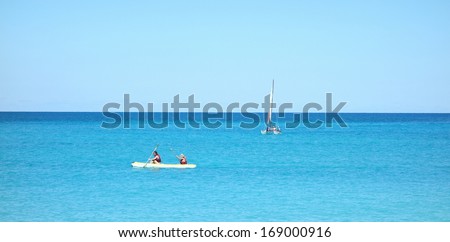 VARADERO, CUBA - DECEMBER 2: Tourists in the Ocean on December 2, 2013 in Varadero, Cuba. Varadero resorts host every year about 1,000,000 international tourists.