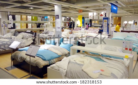 TORONTO, CANADA - MARCH 1, 2014: Bedroom furniture on display at an Ikea store in Toronto, Canada. Founded in Sweden in 1943, Ikea is the world\'s largest furniture retailer.