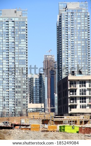 TORONTO, CANADA - APRIL 8, 2014: Modern condo buildings in Toronto. Toronto's boom has helped lead to development of more high rise buildings in 2011 than any other city in North America.