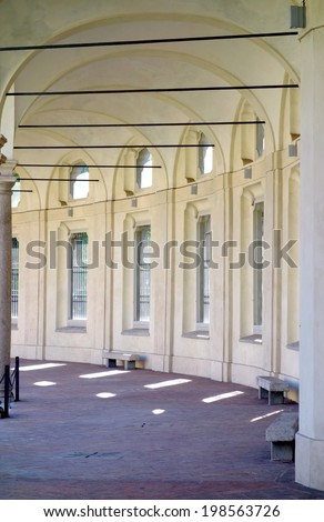 MILAN, ITALY - APRIL 17, 2014: The arcade of the Rotonda della Besana building in Milan. is a late baroque building complex and former cemetery in Milan, Italy, built between 1695 and 1732.