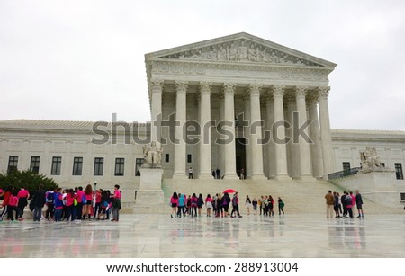 WASHINGTON DC, U.S.A. - APRIL 14, 2015: The facade of the Supreme Court building in Washington DC.
