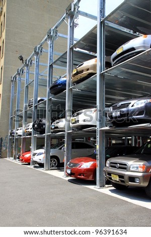 NEW YORK - JULY 15: An automated car parking system on July 15, 2011 in New York. Automatic multi-story automated car park systems are less expensive per parking slot.