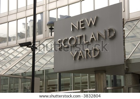 Sign outside New Scotland Yard the headquaters of the Metropolitan police based in London UK