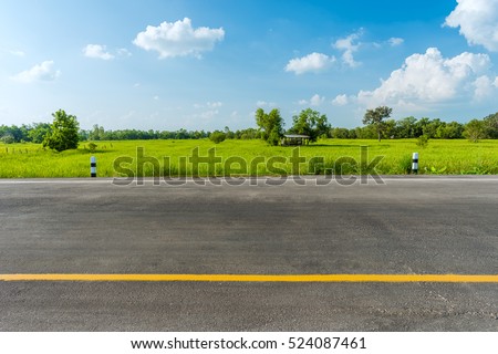 asphalt road and green rice field - Stock Image - Everypixel