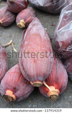 pile of banana blossom for retail sale in local market It is an edible part of banana tree