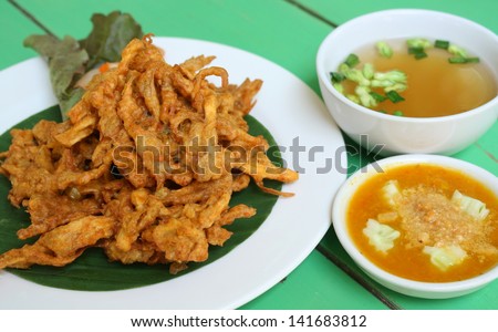 deep fried sajor-caju mushroom patty or mushroom cake serve with vegetable soup and its sauce
