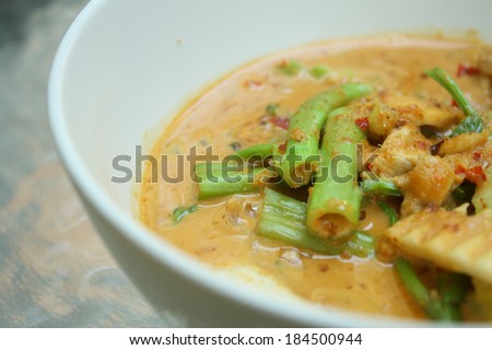 vegetarian thai spicy food. Curry of morning glory, mushroom,gourd, tofu in coconut milk.