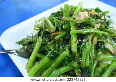 stir fried water spinach with cooked, stir fried morning glory with cooked rice
