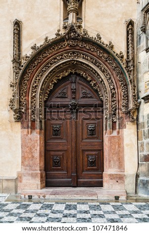 wooden door to city hall in prague