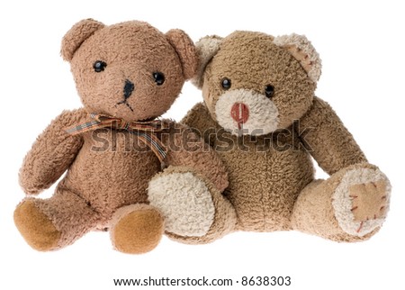 Two sitting teddy bears isolated over white.