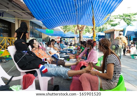 BANGKOK,THAILAND-DECEMBER 2 :The massage camp was built for tired protesters to relax and come back to protest again on Ratchadumnoen road in Bangkok on December 2,2013 in Bangkok,Thailand