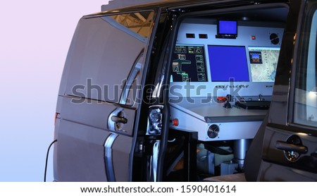 Similar – Image, Stock Photo Radar control, modern, mobile radar unit for speed measurement, enforcement trailer. Infrared flash triggers when a convertible driver exceeds the speed limit.